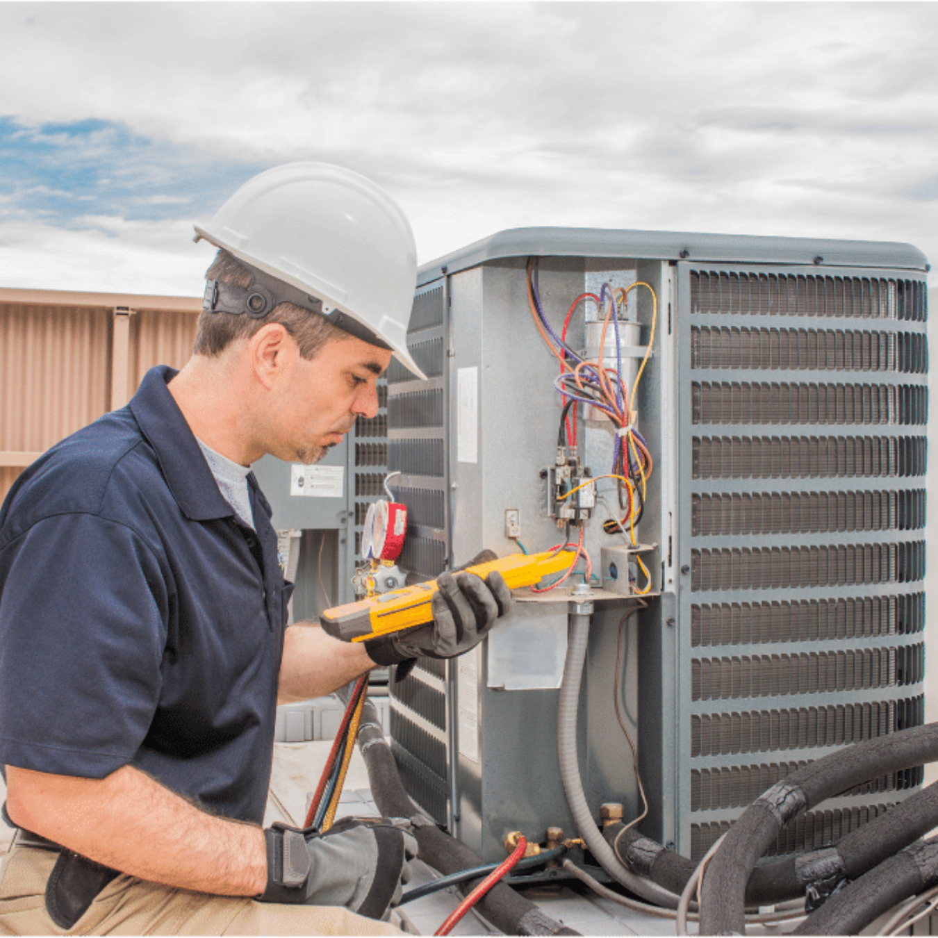 London, Ontario HVAC technician ready to install a fireplace