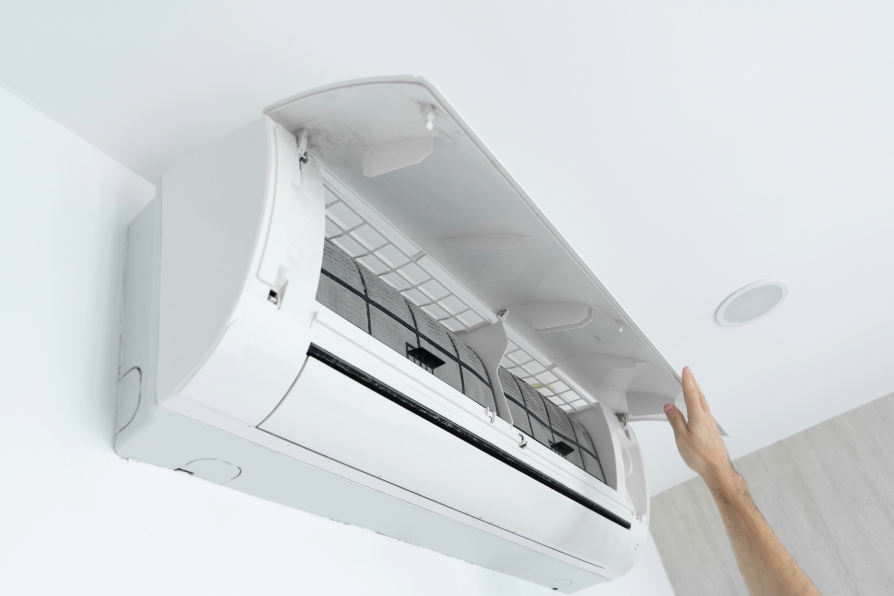 Ductless mini-split air conditioner installed on an interior wall in London, Ontario